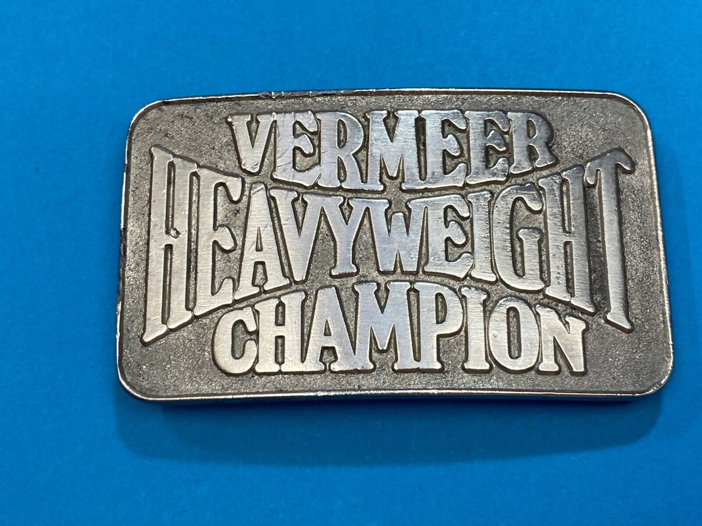 Vermeer Heavyweight Champion Belt Buckle by Spec Cast