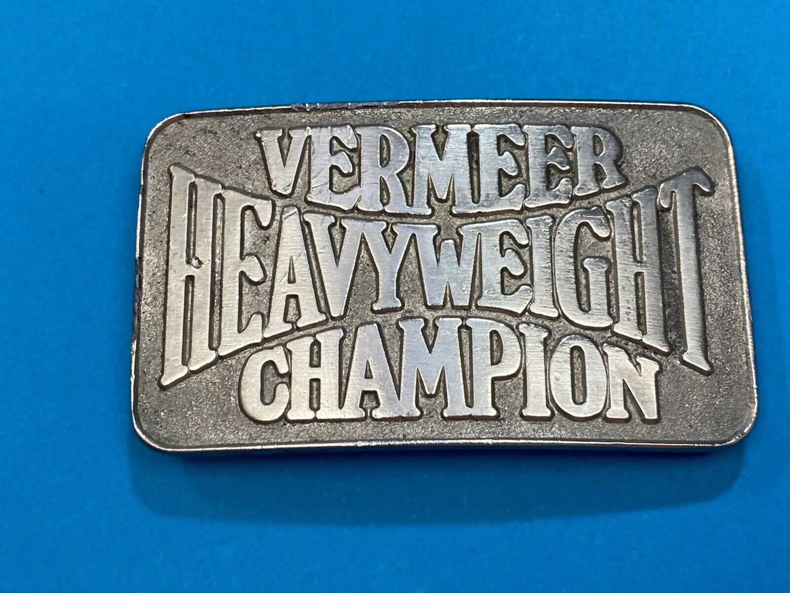 Vermeer Heavyweight Champion Belt Buckle by Spec Cast