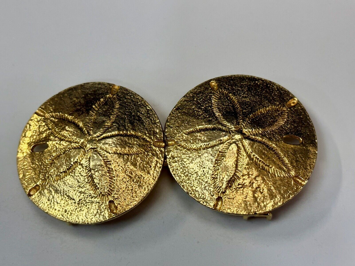 Two piece interconnecting Sand Dollars  vintage belt buckle by Mimi Di N