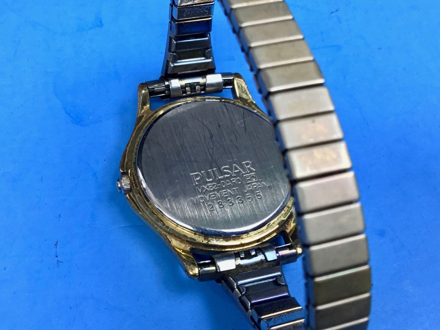 Vintage Ladies  Gold Tone Pulsarwatch Skinny Stretch Band Vx82-Oaro  