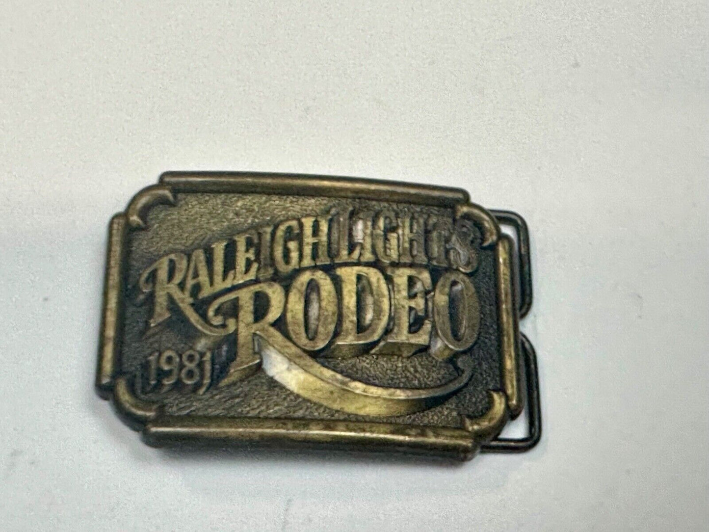 Vintage 1981 Raleigh Lights Rodeo Brass Tone Belt Buckle Advertising Cigarettes