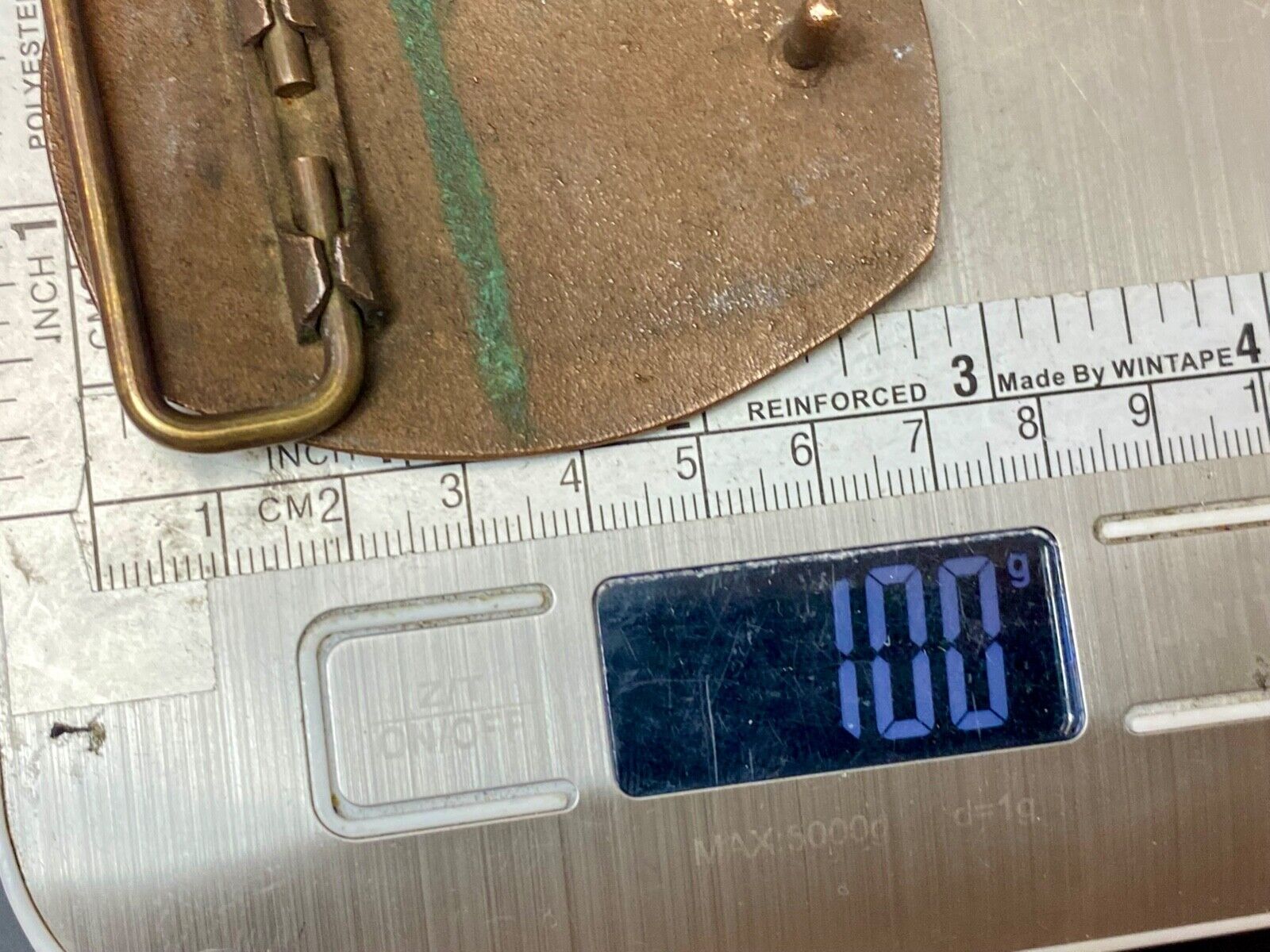 unknown to me - cattle branding symbols? longhorn western? belt buckle