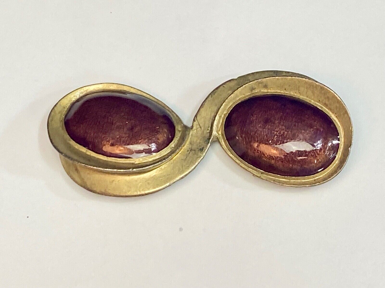 Vintage ELLE Brooch Pin Gold Tone Double Swirl w/ Two Deep Red Cabuchon Stones