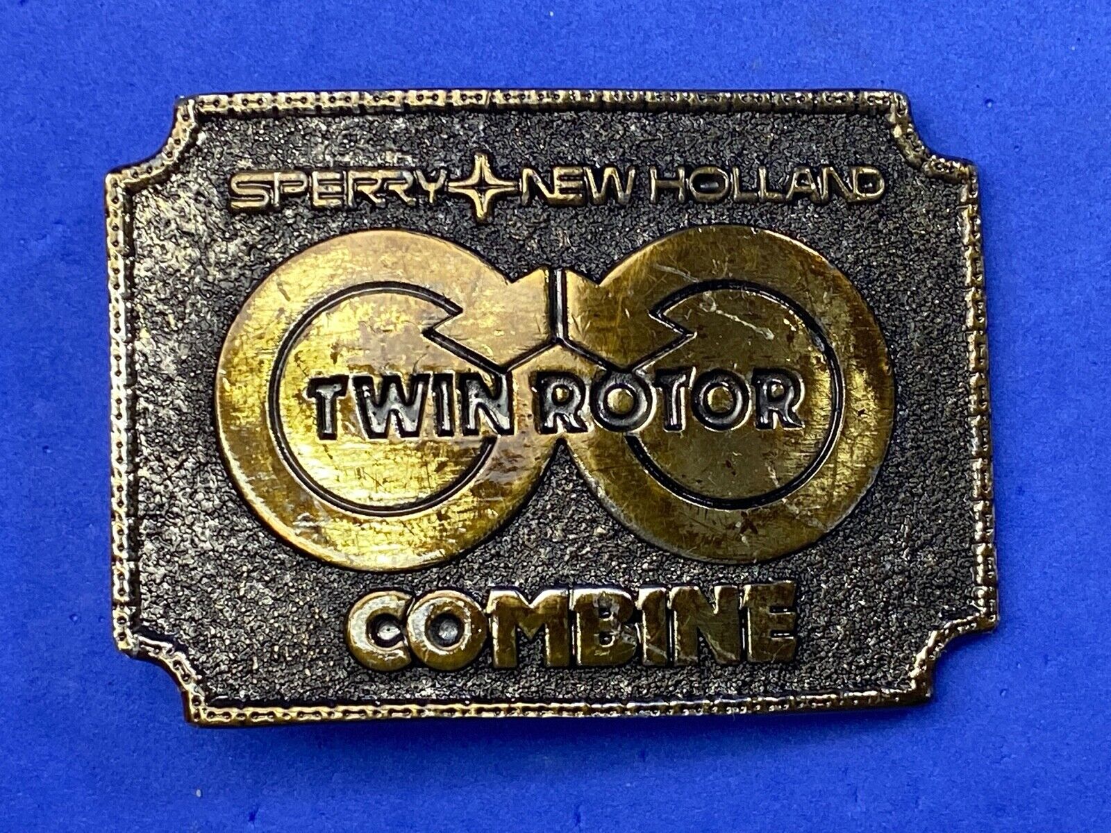 Vintage 1970's Sperry New Holland Employee Patch Twin Rotor Combine belt buckle 
