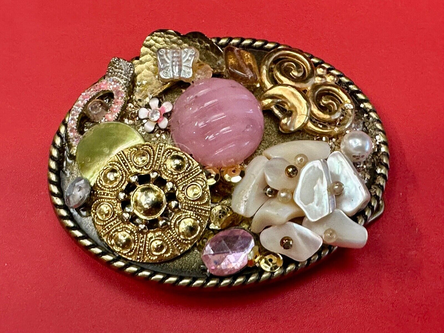 Artisan Abstract flowers made of mixed material on gold tone oval belt buckle