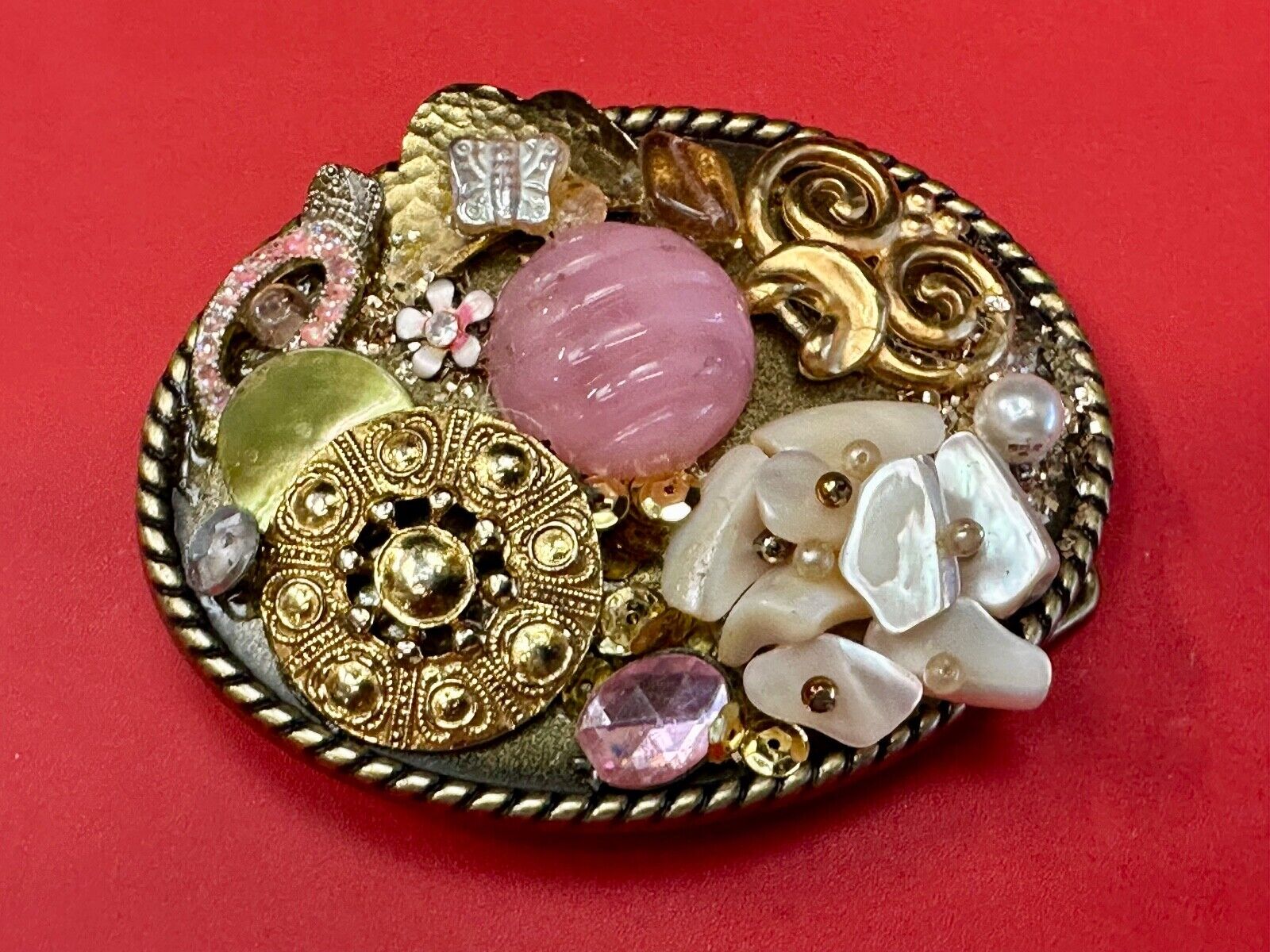 Artisan Abstract flowers made of mixed material on gold tone oval belt buckle