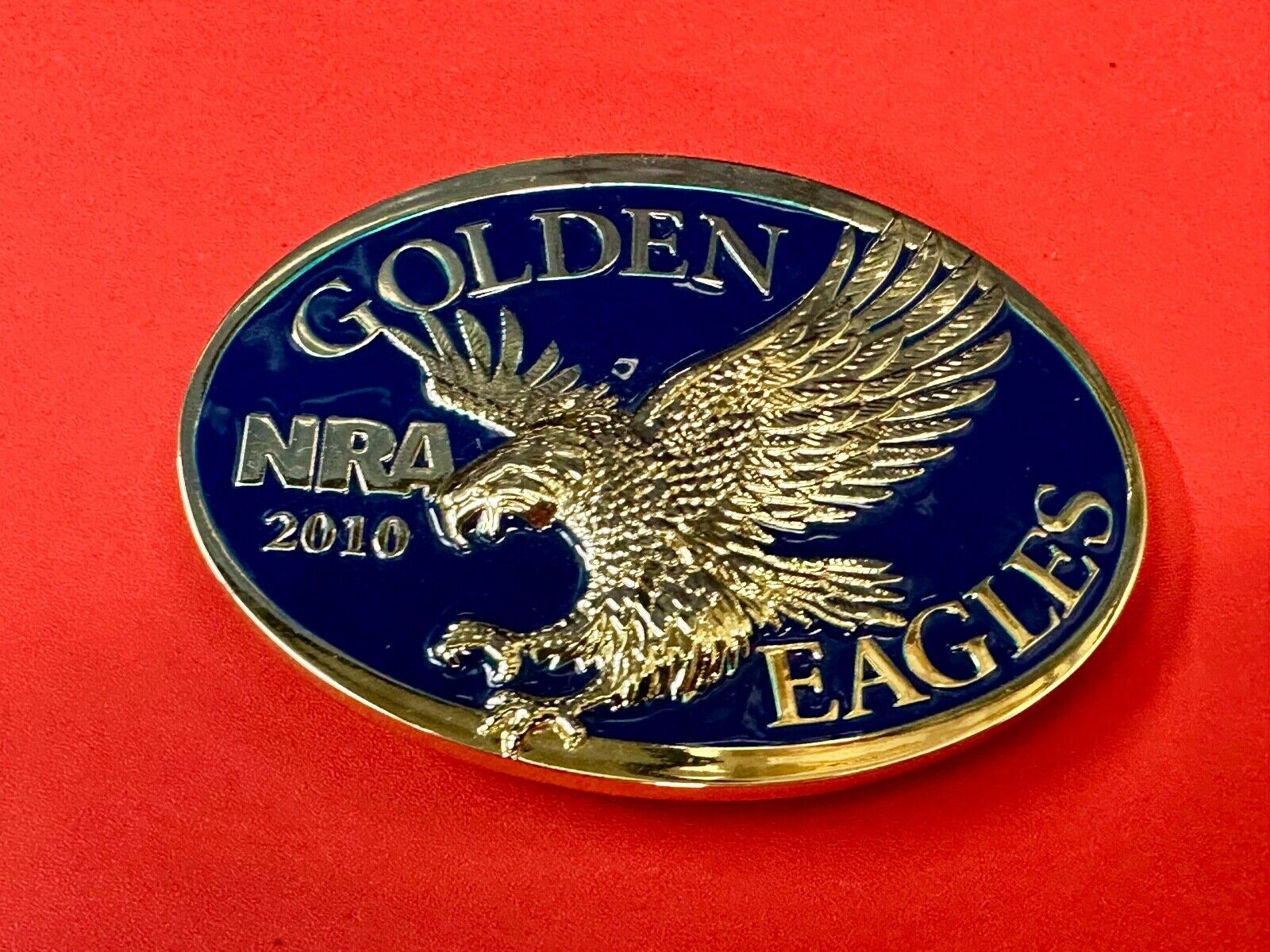 2010 NRA National Rifle Association Golden Eagle blue ribbon belt buckle in box