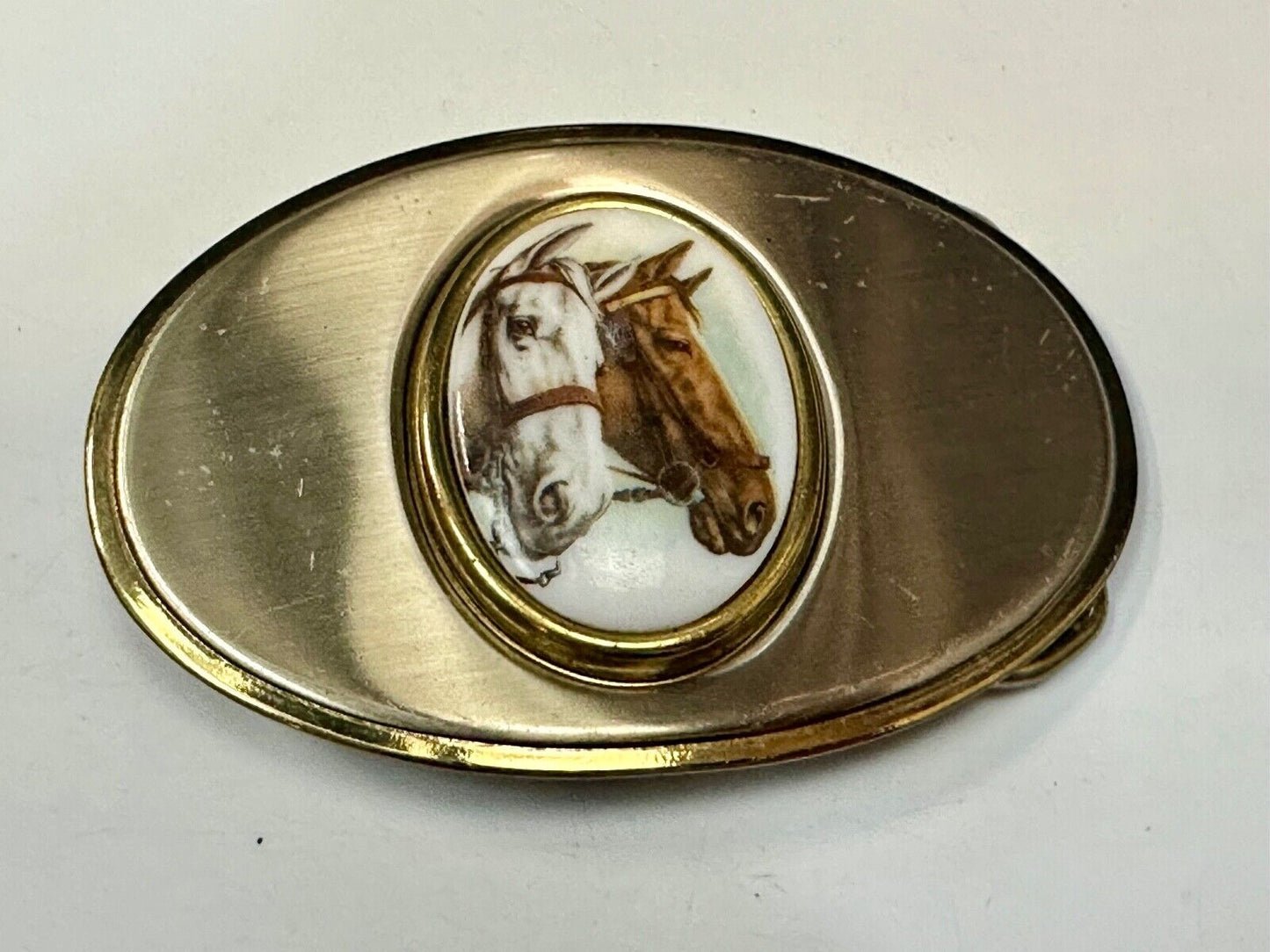 Two horse head picture in oval smooth gold tone Vintage Belt Buckle