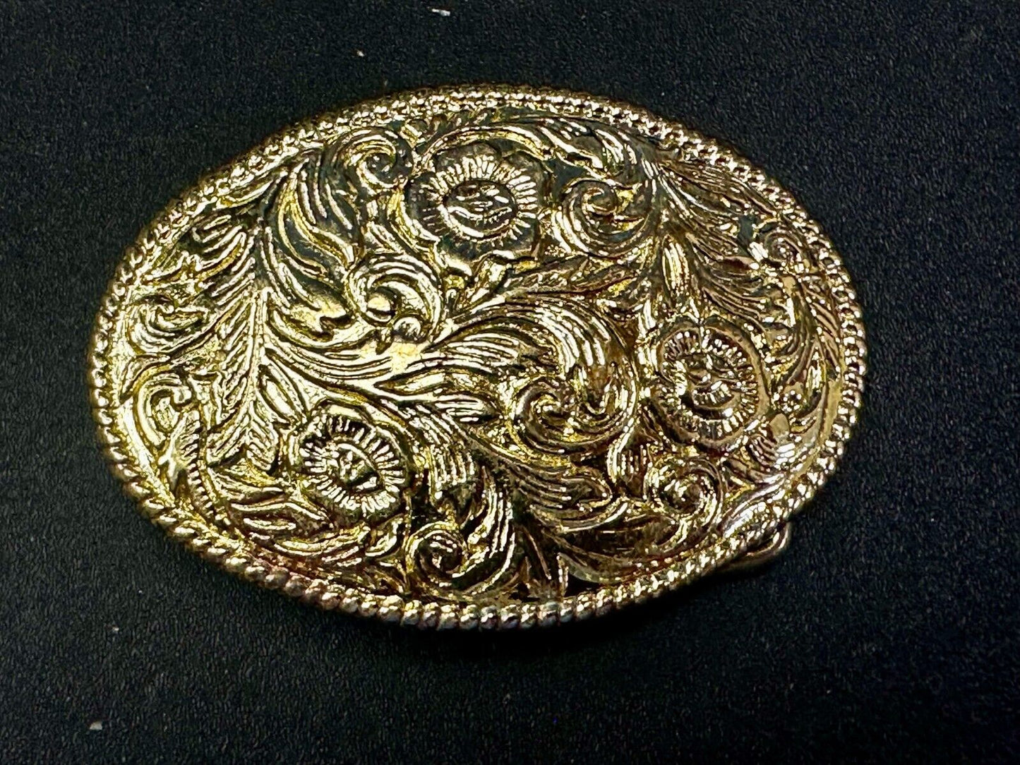 Vintage gold tone western flower swirl design belt buckle