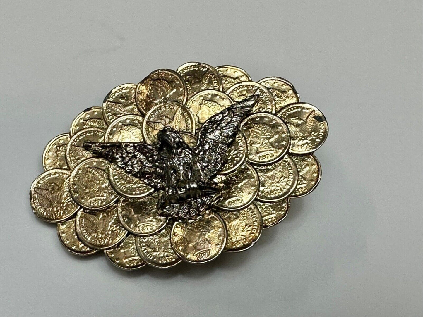 American Eagle wings wide over cluster of Indian Head Coins belt buckle