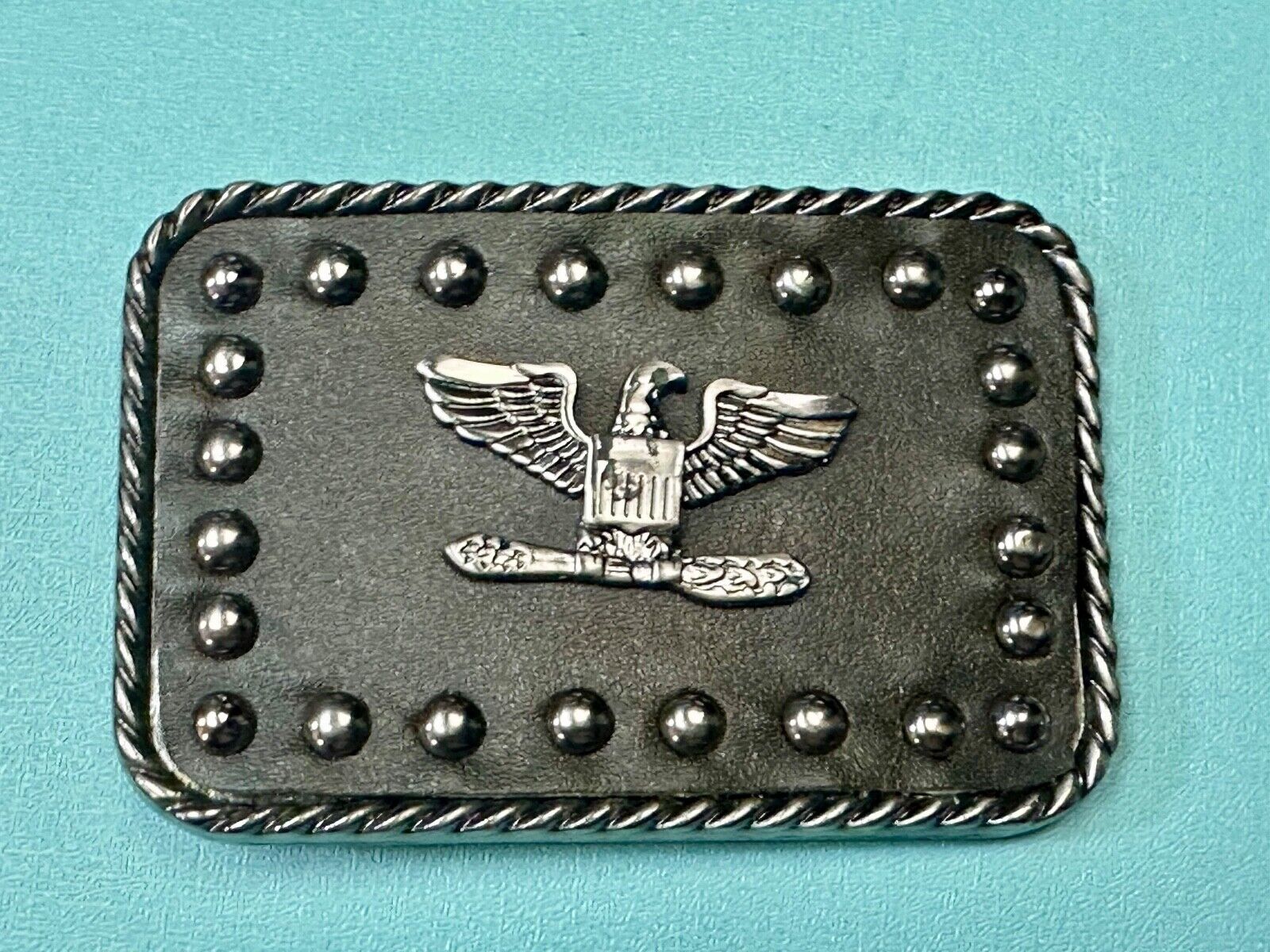 American Eagle - biker style studded black leather background belt buckle