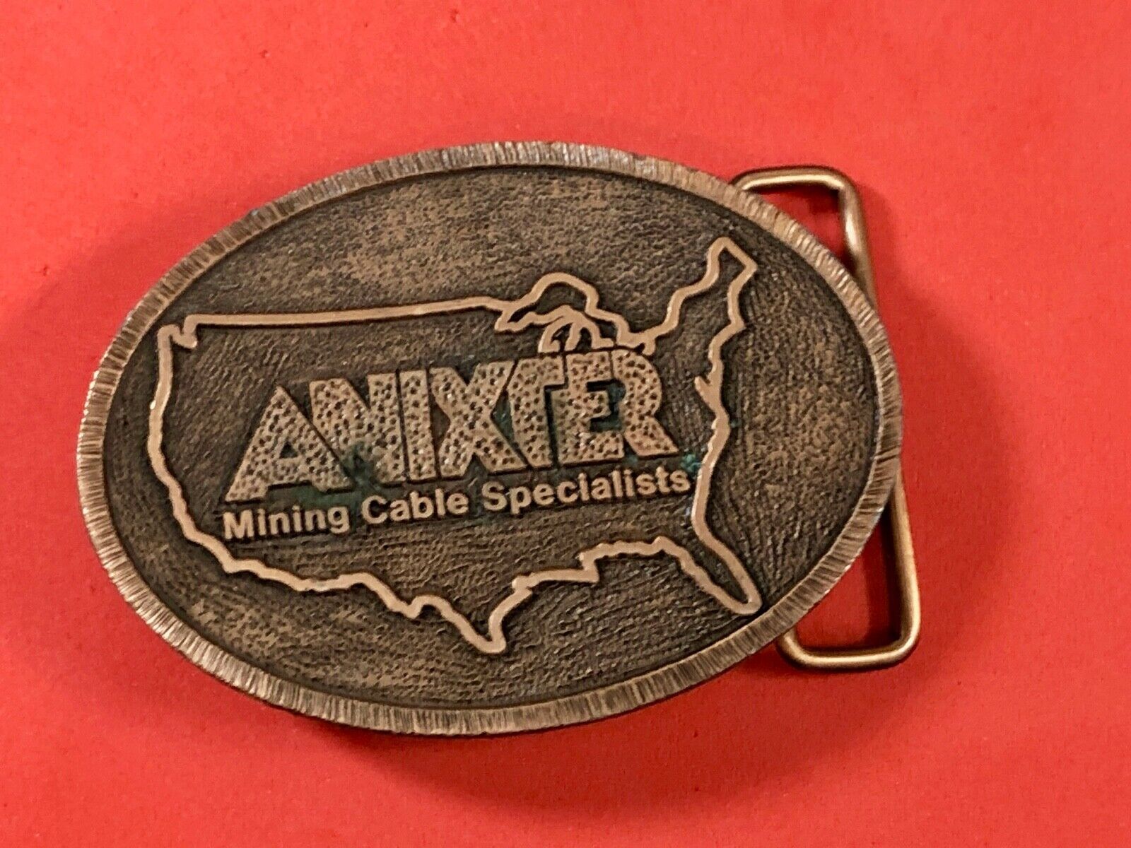Anixter Mining Cable Specialists company promotional belt buckle by Hit Line 