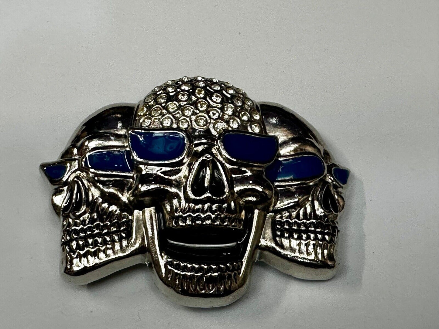 Three Skull's Heads Rhinestone Accented W/ Blue Shades Silver Tone Belt Buckle