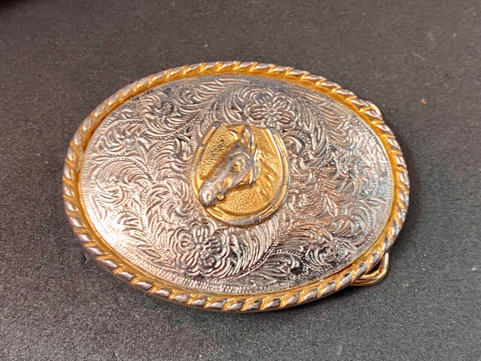 Vintage horse head inside of lucky horseshoe two toned western belt buckle