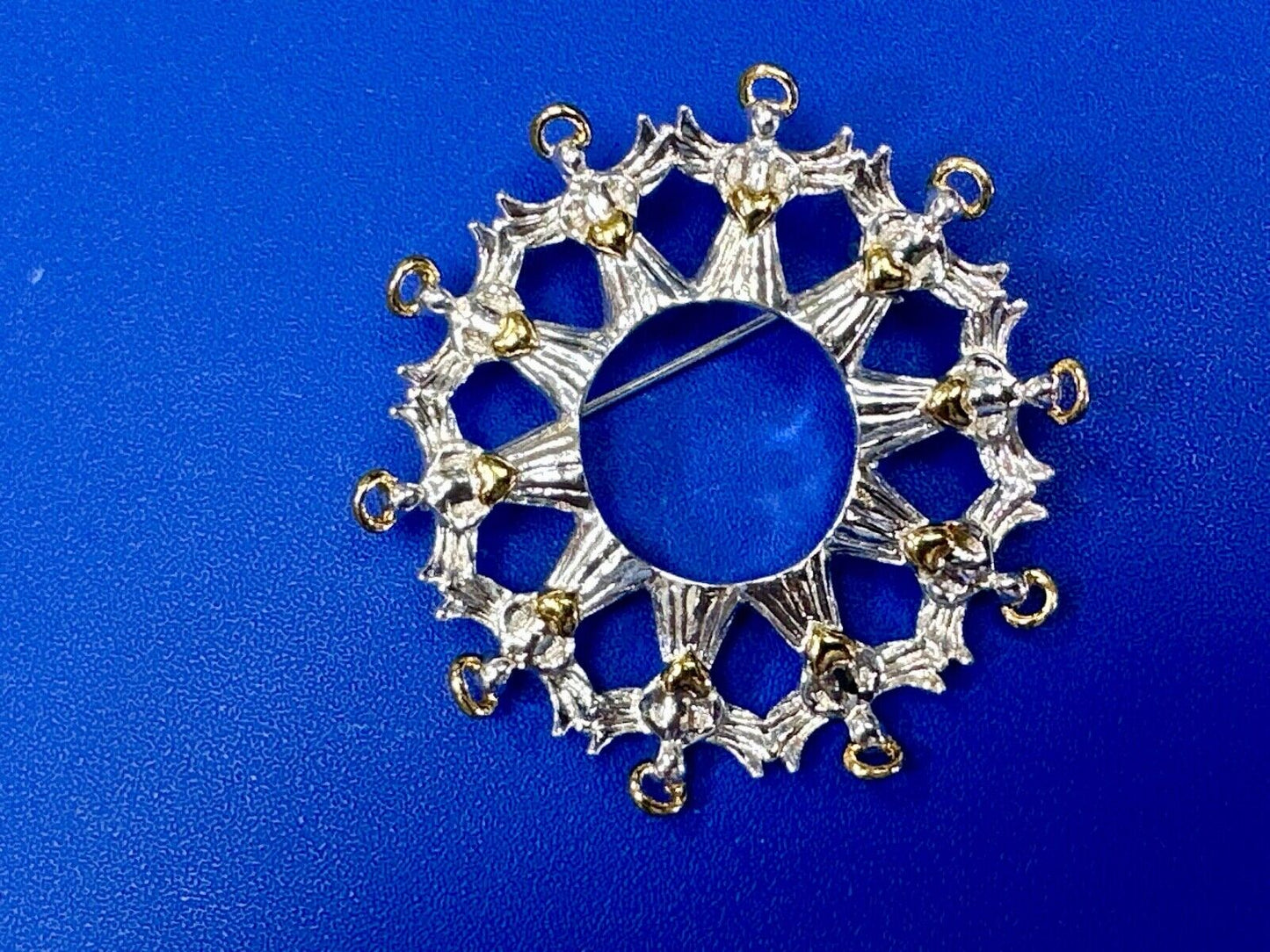 Angles in Circular pattern holiday wreath Avon signed vintage brooch pin