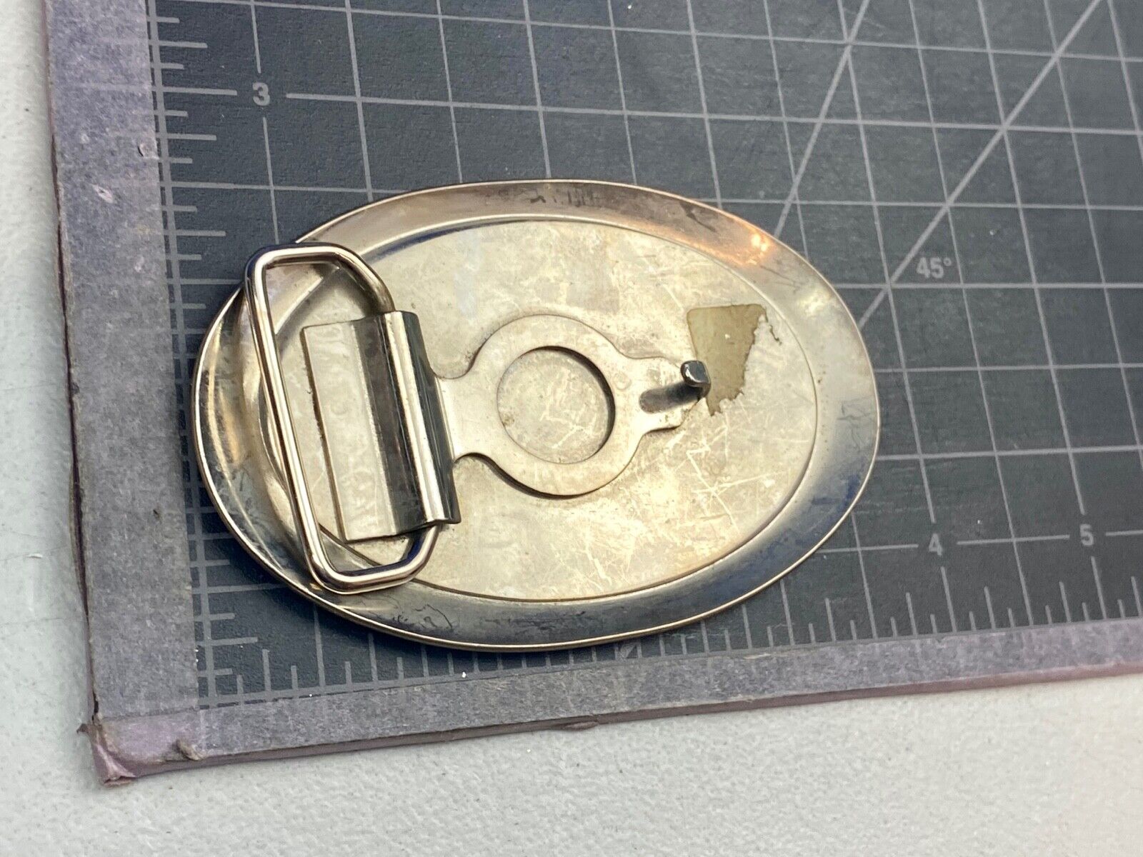Unique XXX gold tone belt buckle tic tac toe pattern