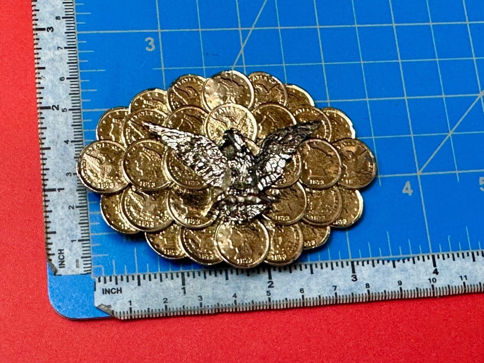 American Eagle wings wide over cluster of Indian Head Coins belt buckle