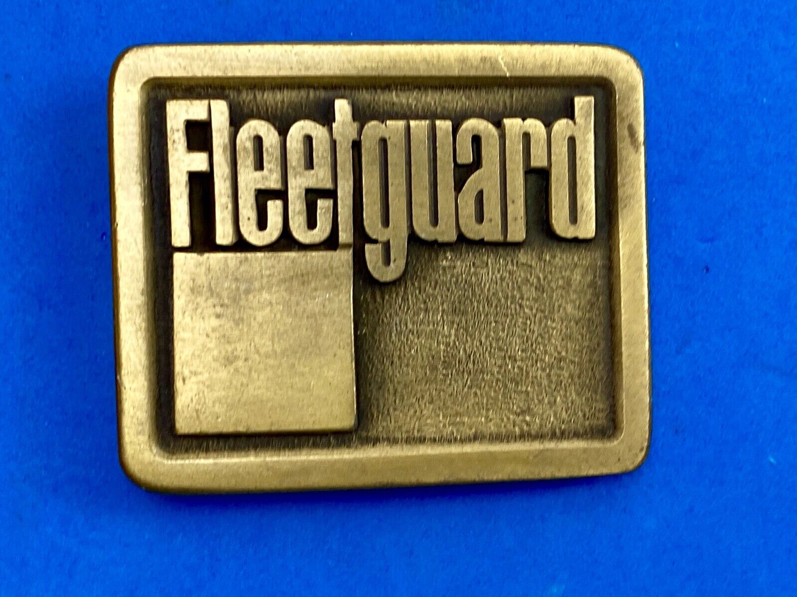 Vintage Fleetguard Construction Equipment Company Advertising Belt Buckle 