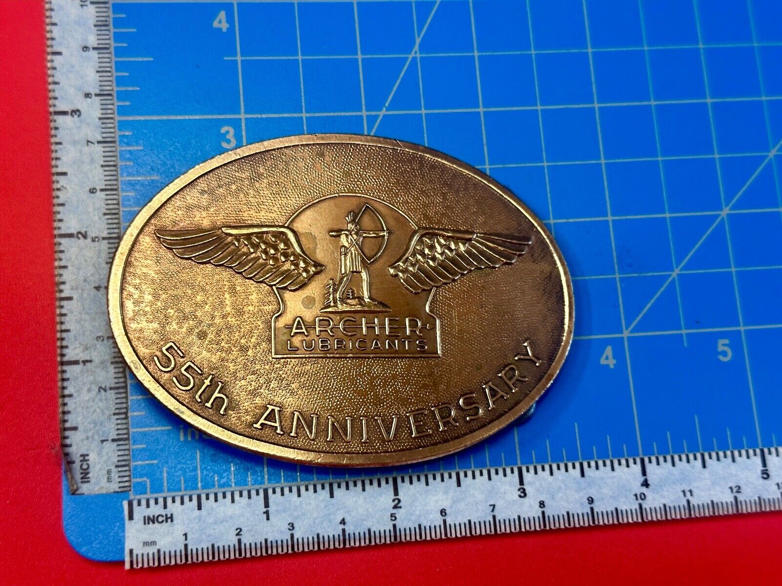 Archer Lubricants Omaha NE - Oil for farmers ranchers belt buckle