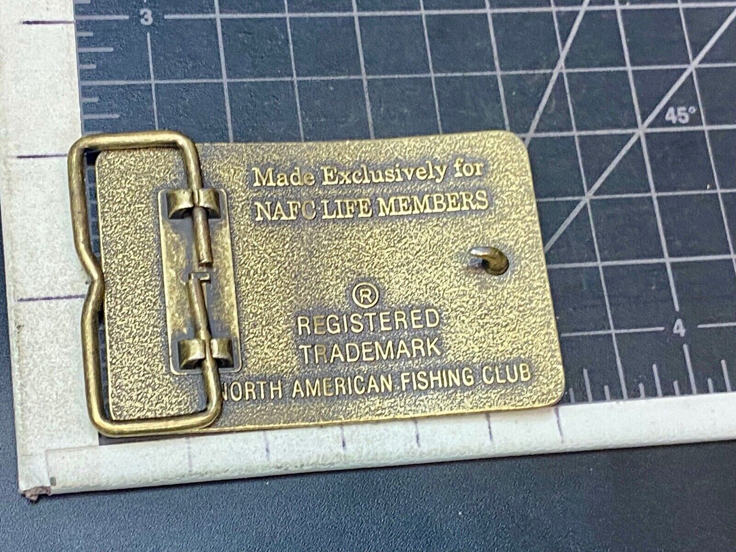 Vintage Life Member of the North American Fishing Club brass tone belt buckle 