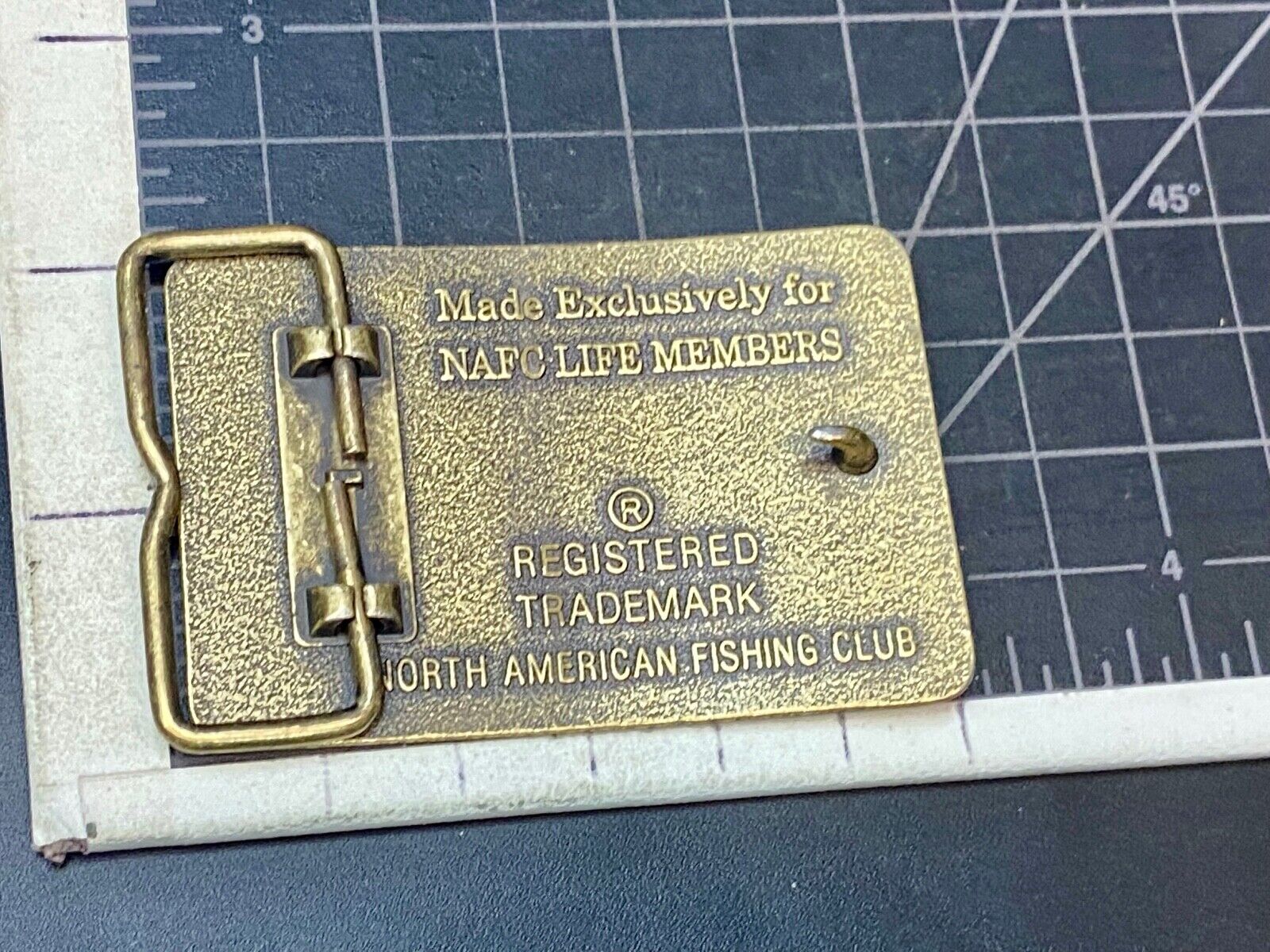Vintage Life Member of the North American Fishing Club brass tone belt buckle 