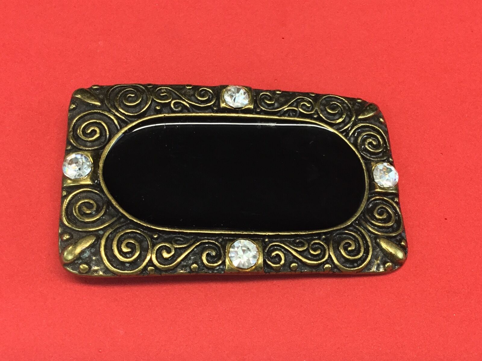 3.5".  Designer / western / dress / Black and brass tone rhinestone belt buckle