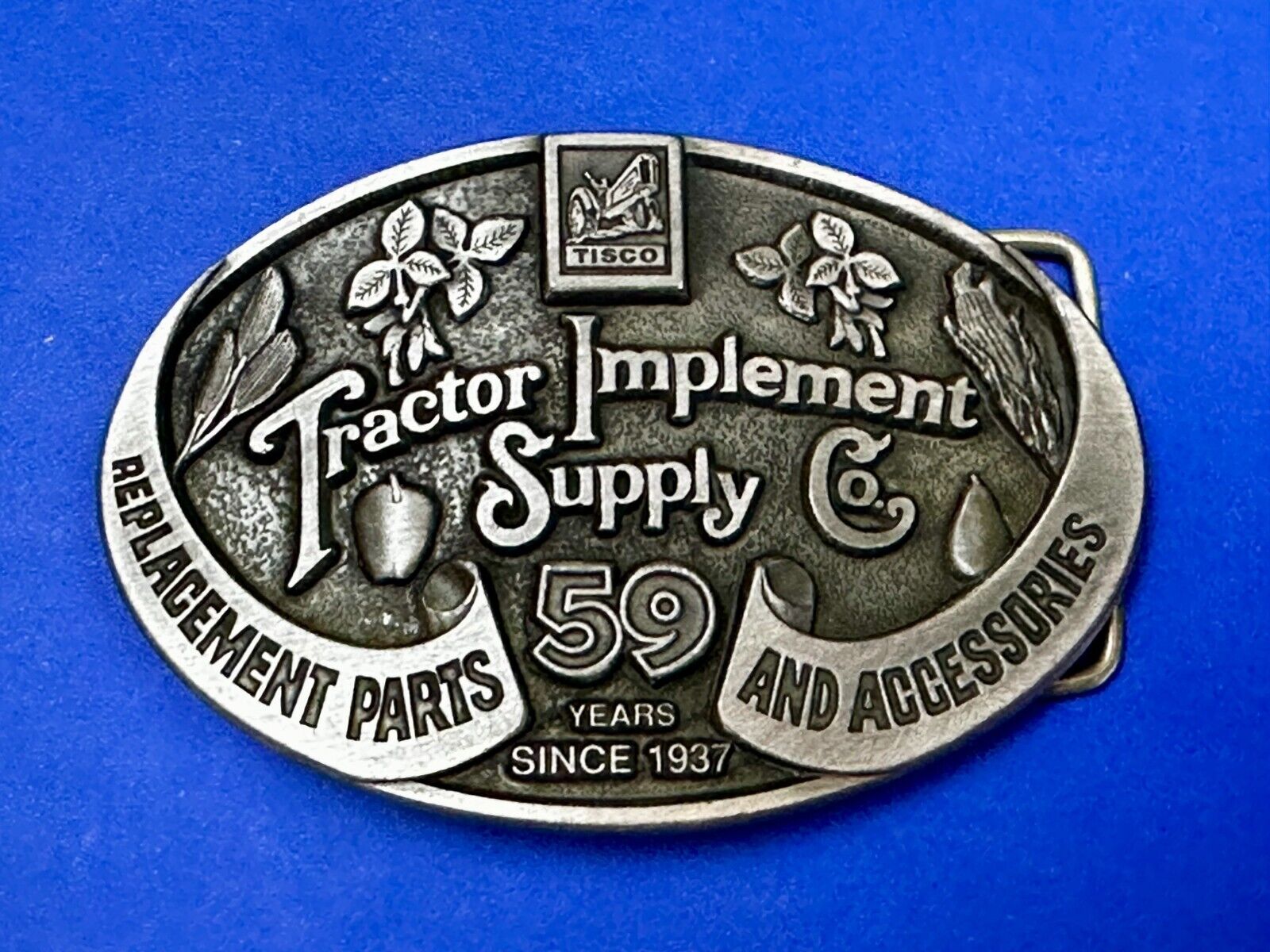 59 Years TISCO Tractor Implement Supply company Belt Buckle by Speccast