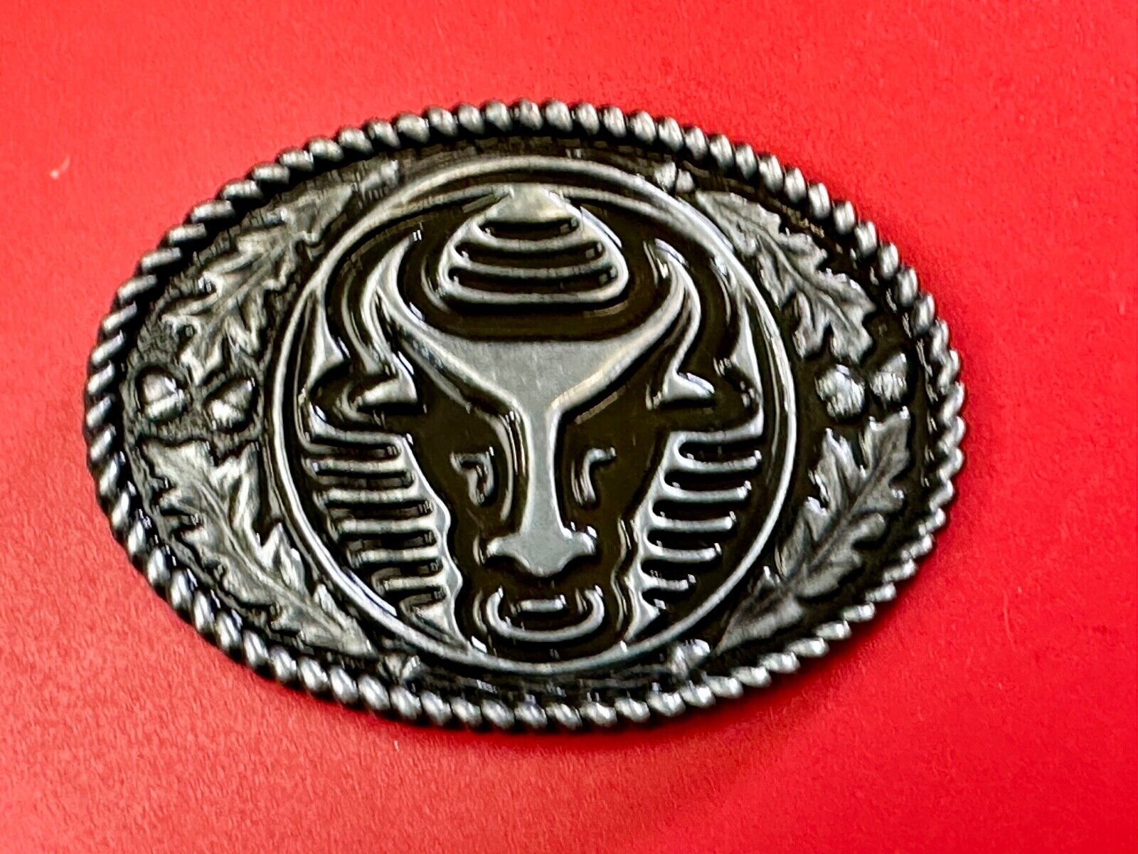 The Longhorn cow steer with nose ring Vintage rope boarder belt buckle