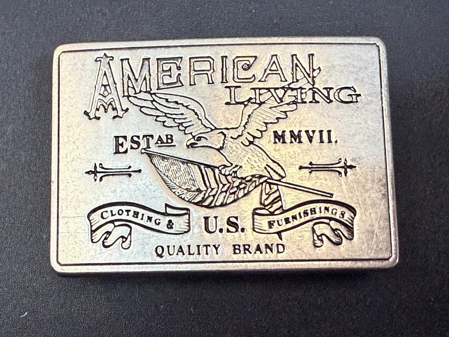 American Living Clothing & Furnishing U.S Quality Brand Promo Belt Buckle