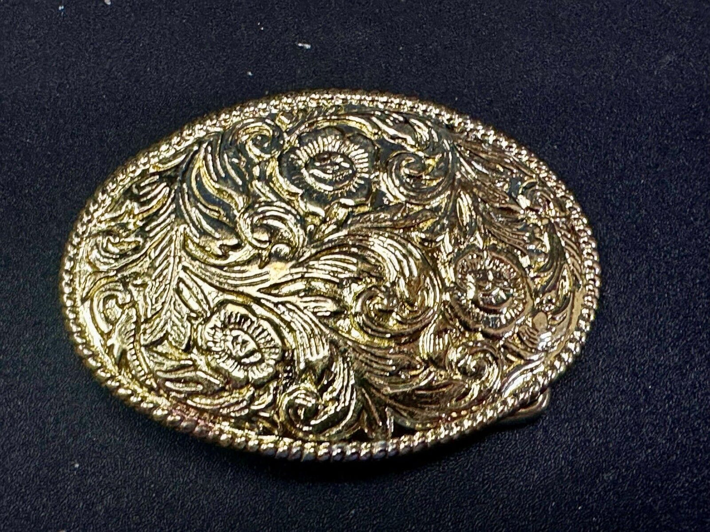 Vintage gold tone western flower swirl design belt buckle