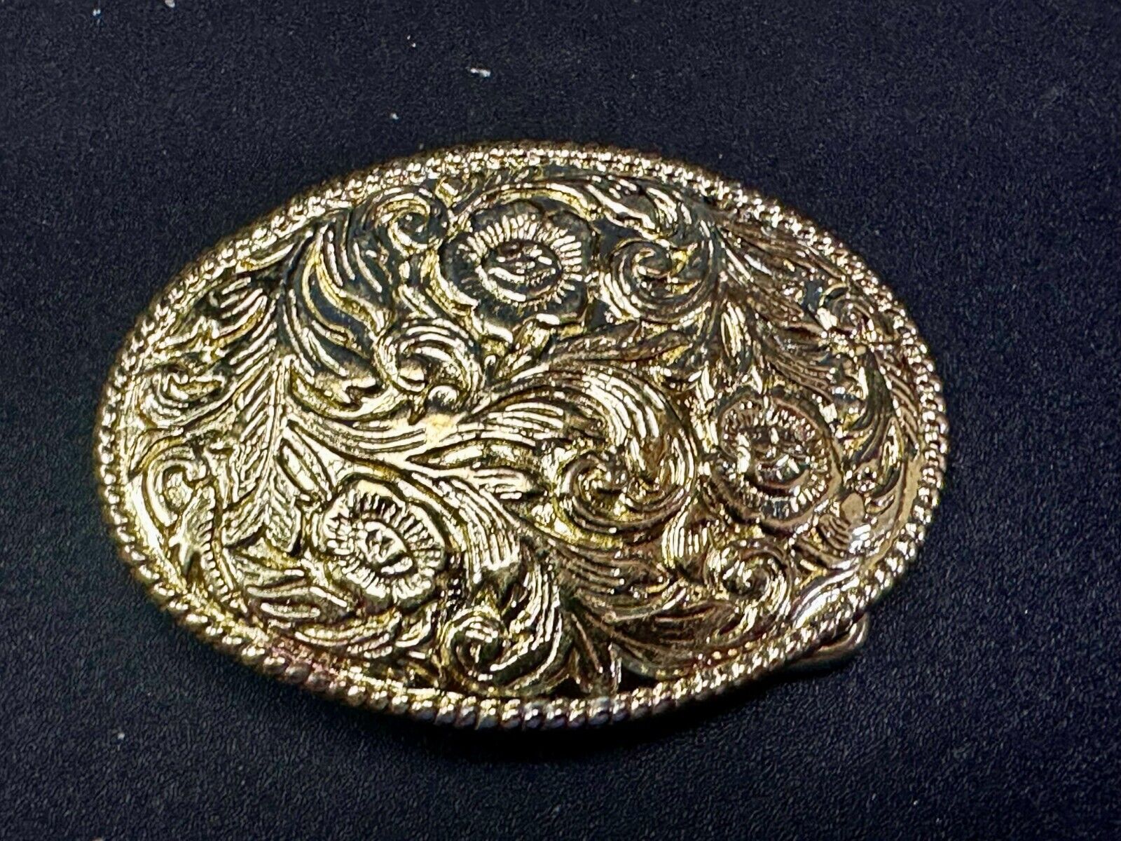 Vintage gold tone western flower swirl design belt buckle
