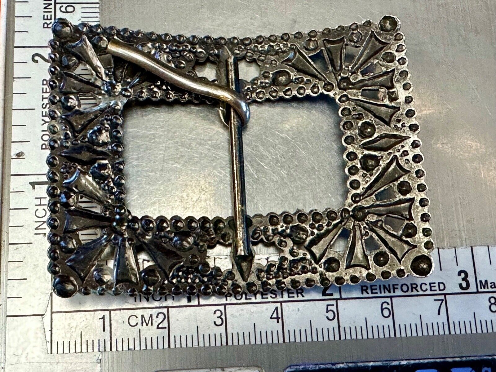 Antique silver color rectangular see through ornate belt buckle