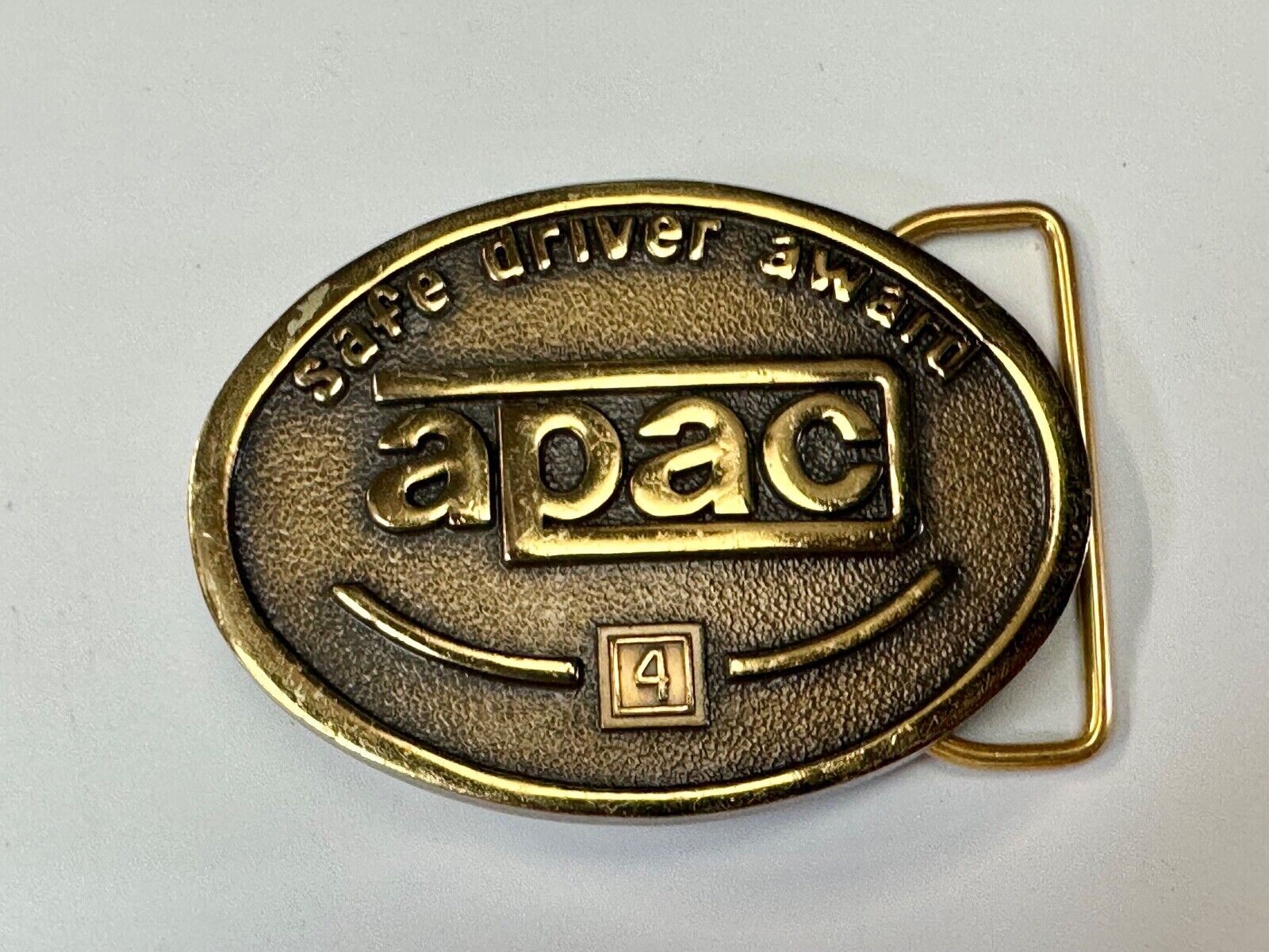APAC Safe Driver Award belt buckle with 4 year pin by Jostens