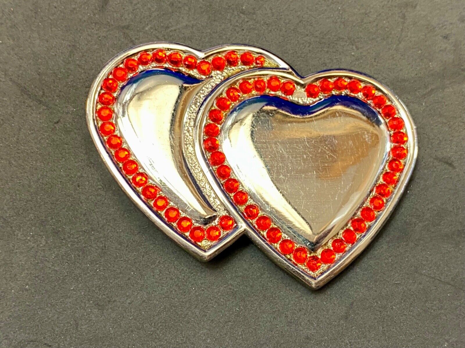 Two Jeweled Hearts Red Rhinestone outlining silver tone cutout belt buckle