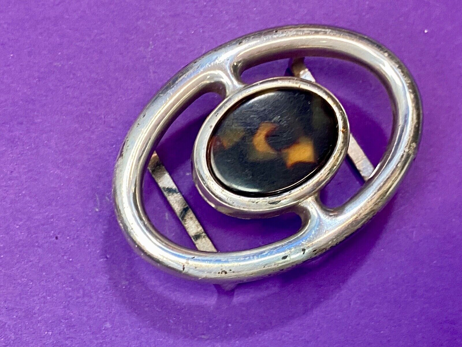 Vintage enamel? centerpiece on western silver tone see though 2.5" belt buckle 