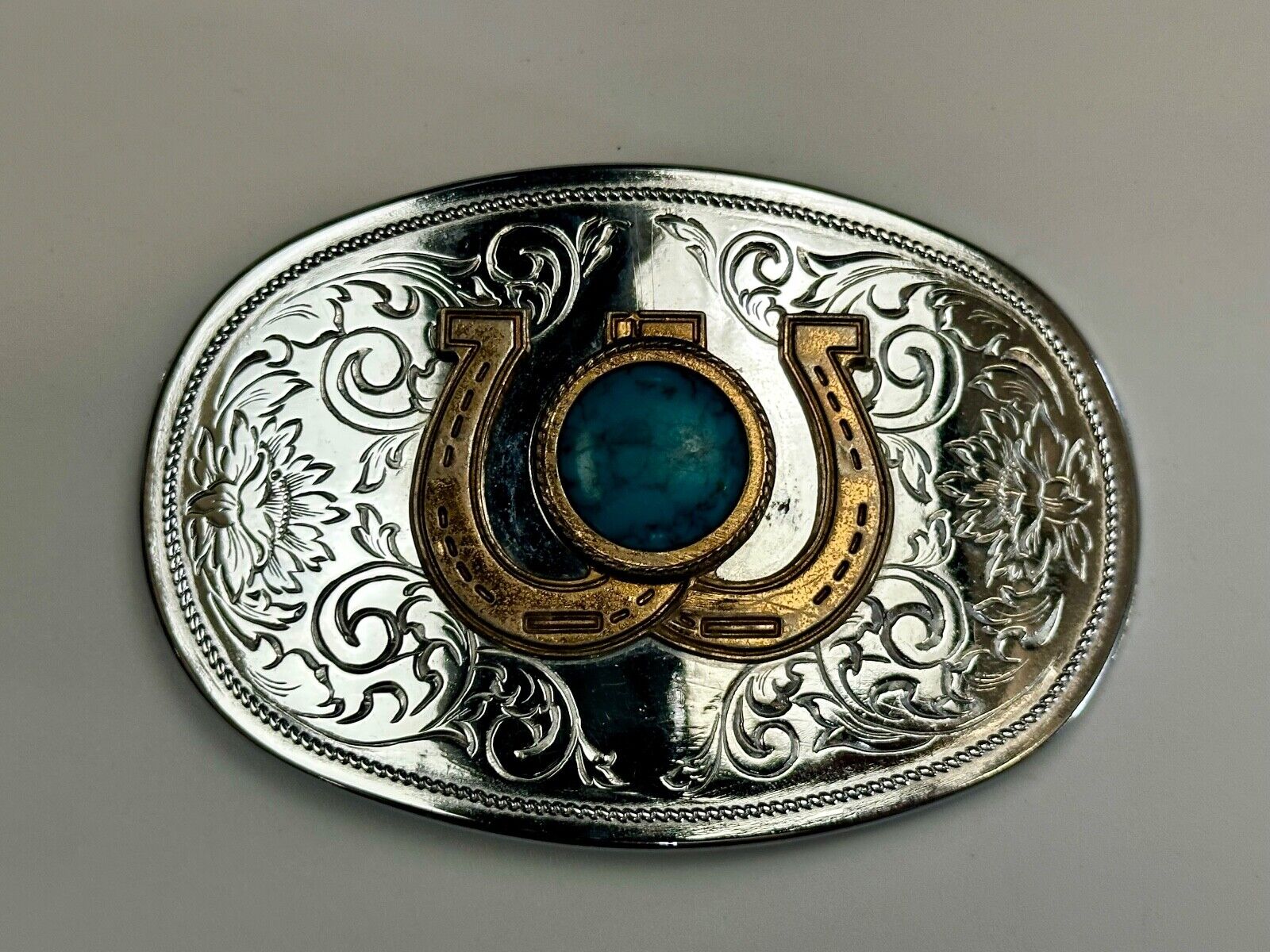 Turquoise centerpiece in  lucky horseshoe - two tone reflective belt buckle