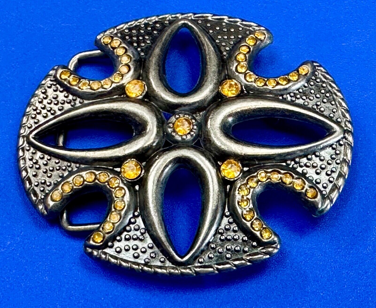 unique see through iron cross with golden brown rhinestone accents