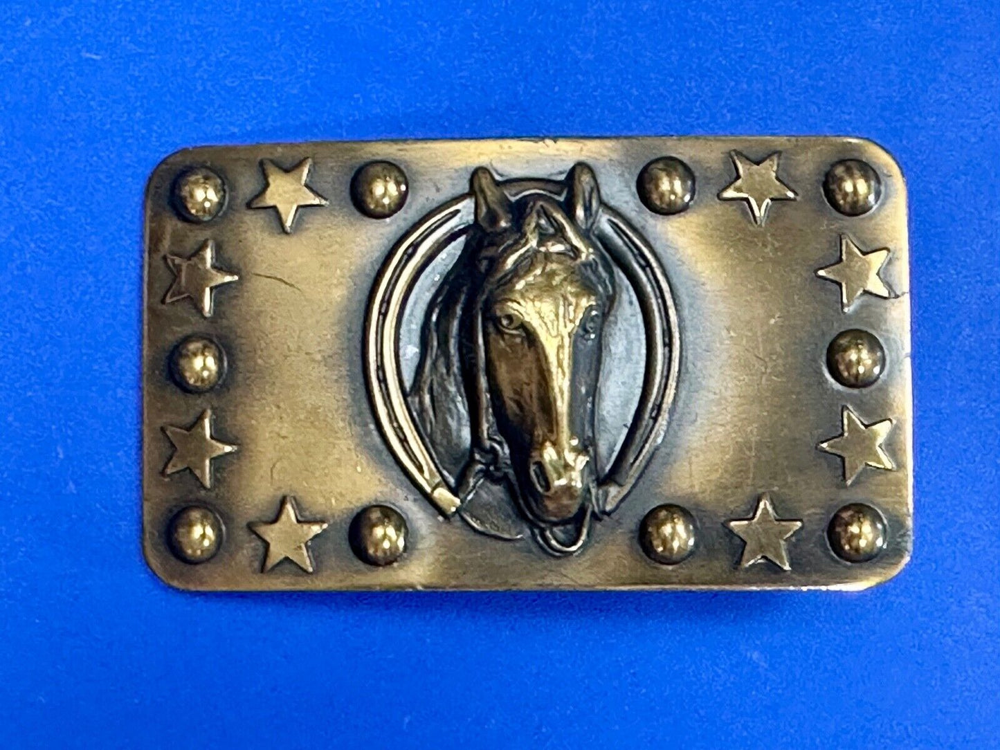 Vintage Horse head belt buckle with stars and circles boarder