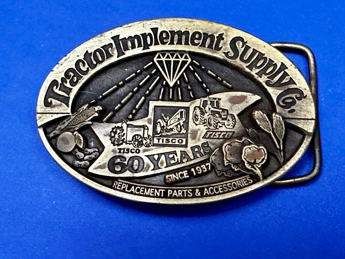 60 Years TISCO Tractor Implement Supply company NOS Belt Buckle by Speccast