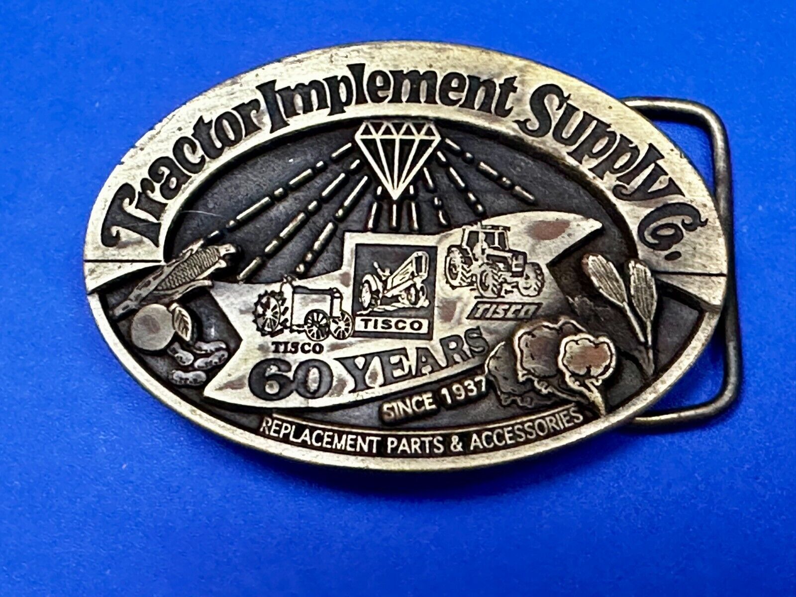 60 Years TISCO Tractor Implement Supply company NOS Belt Buckle by Speccast