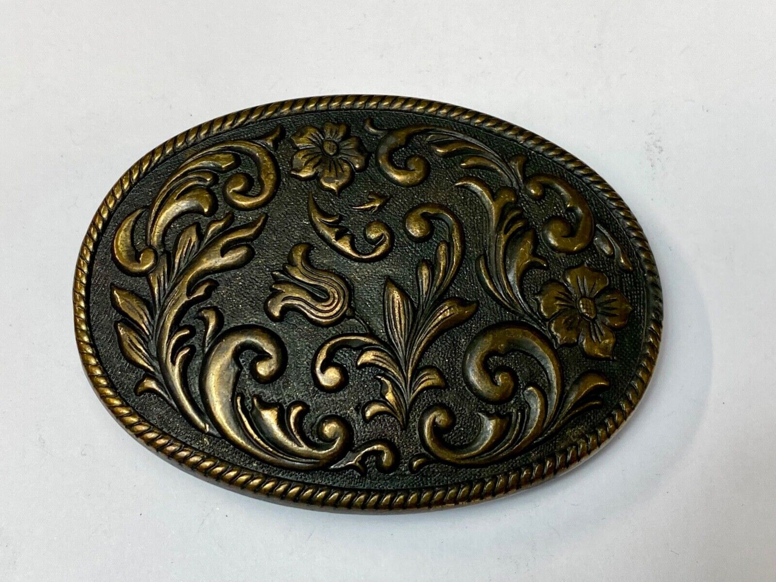 Vintage Dark Western flower swirl Oval Cowgirls belt buckle