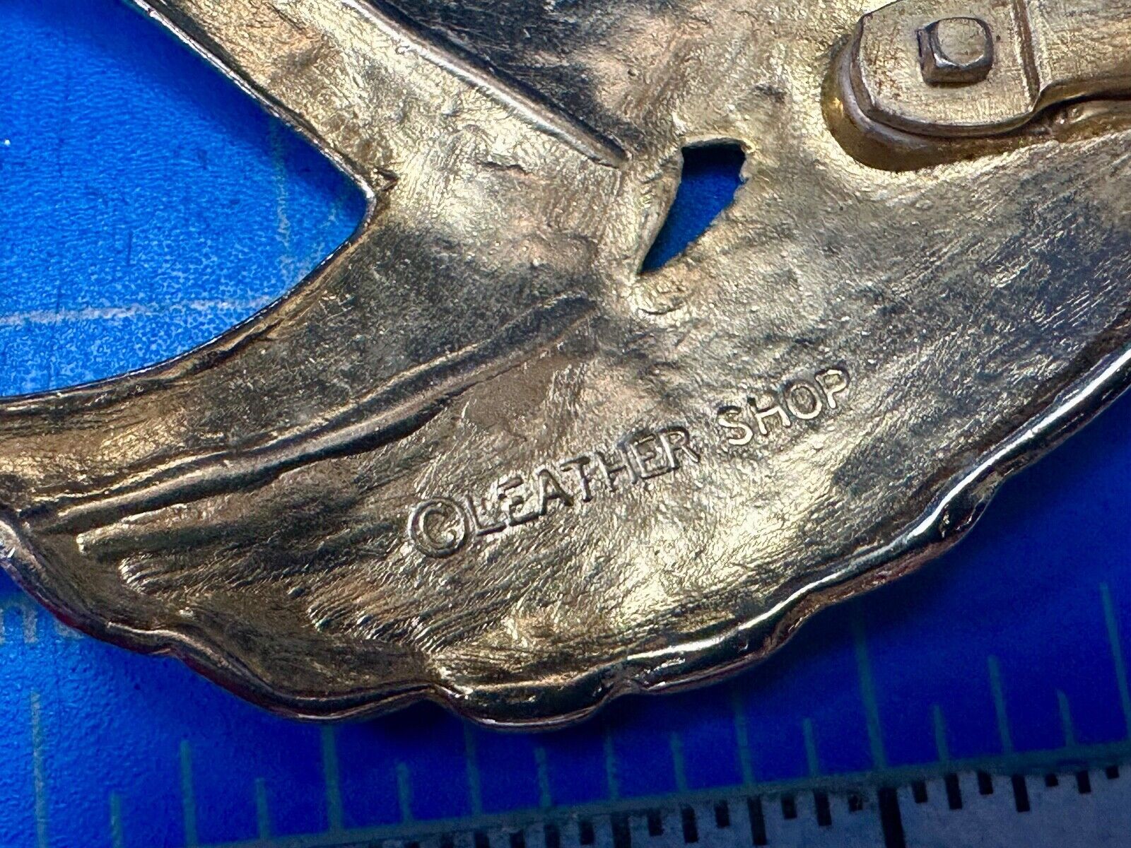 Abstract Art - Wings  gold tone belt buckle signed Leather shop
