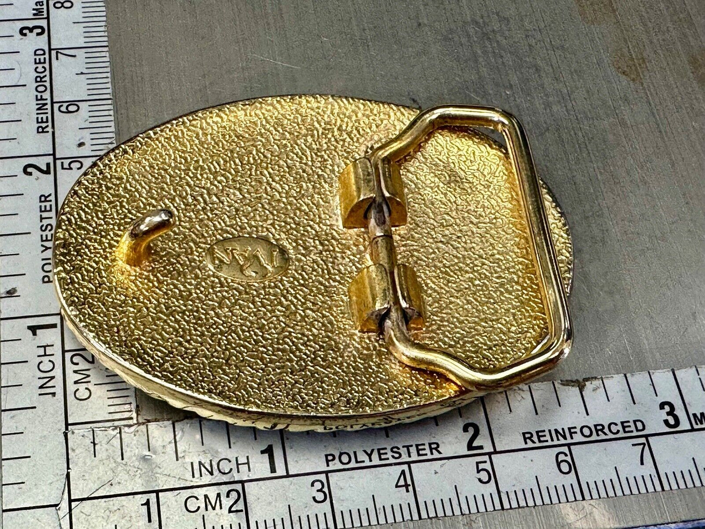 vintage Ivan Brand western flower swirl design two tone oval belt buckle