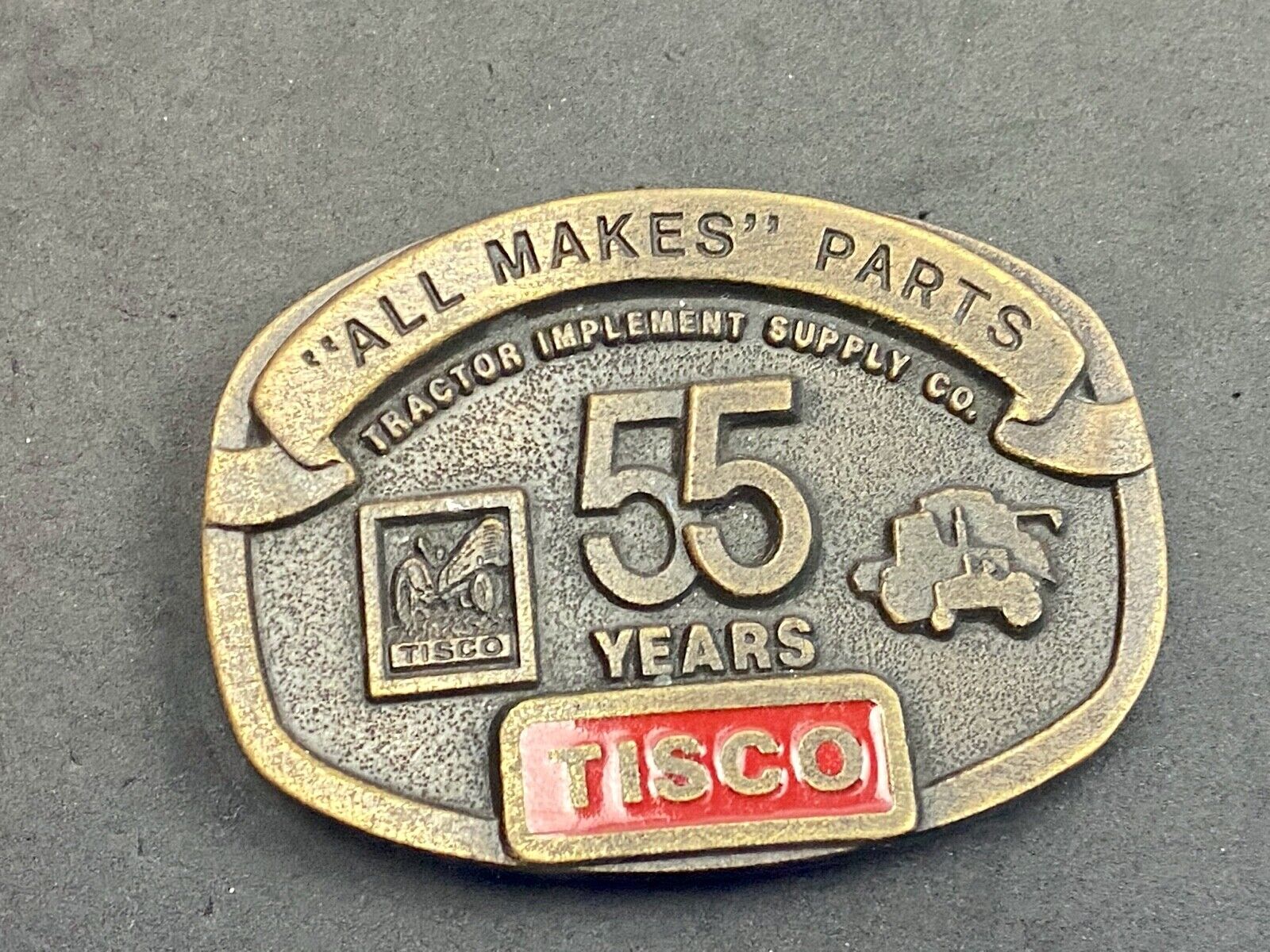 55 years Tisco Tractor Implement Supply Spec Cast Brass Belt Buckle series 2