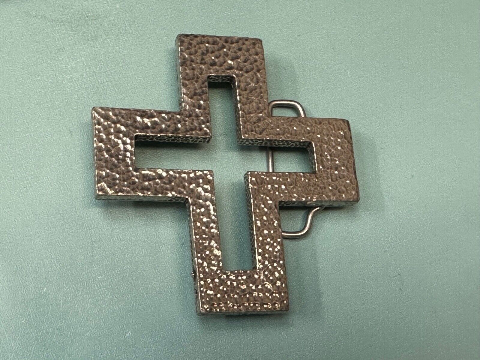 A.P.W. 2007 cross cutout silver tone belt buckle