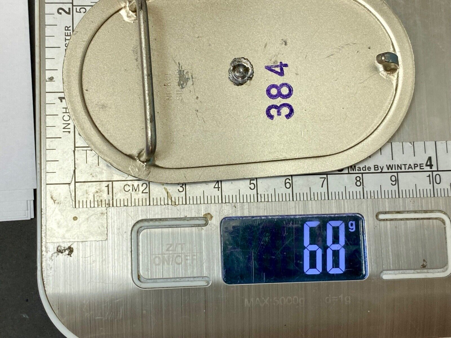 Vintage western oval Rodeo Cowboy on bucking bronc? bull numbered belt buckle