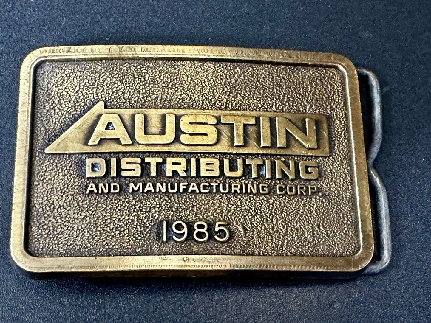 Austin Texas Distributing and Manufacturing 1985 Advertisement Promo Belt Buckle