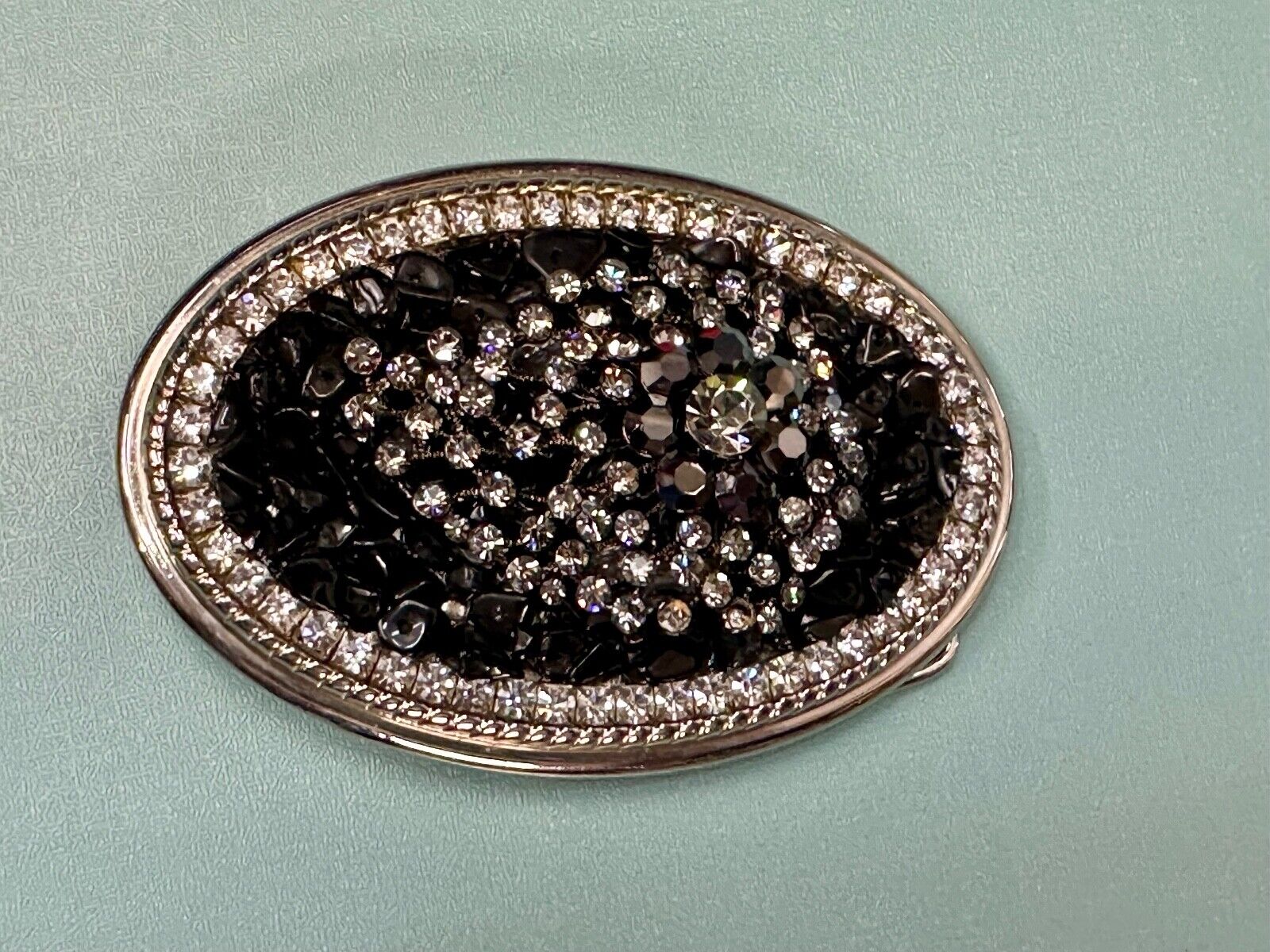 Artisan GHOST? Abstract animal head belt buckle covered in black rhinestone's