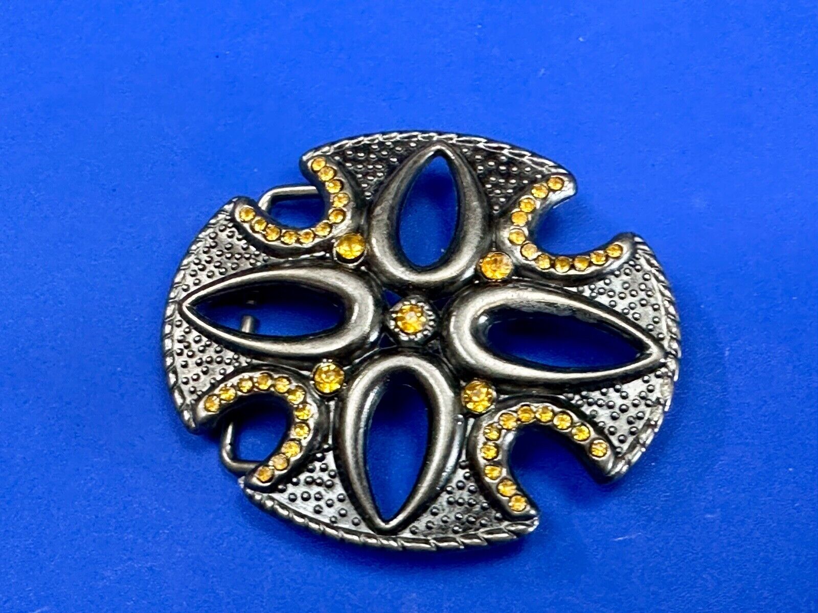 unique see through iron cross with golden brown rhinestone accents