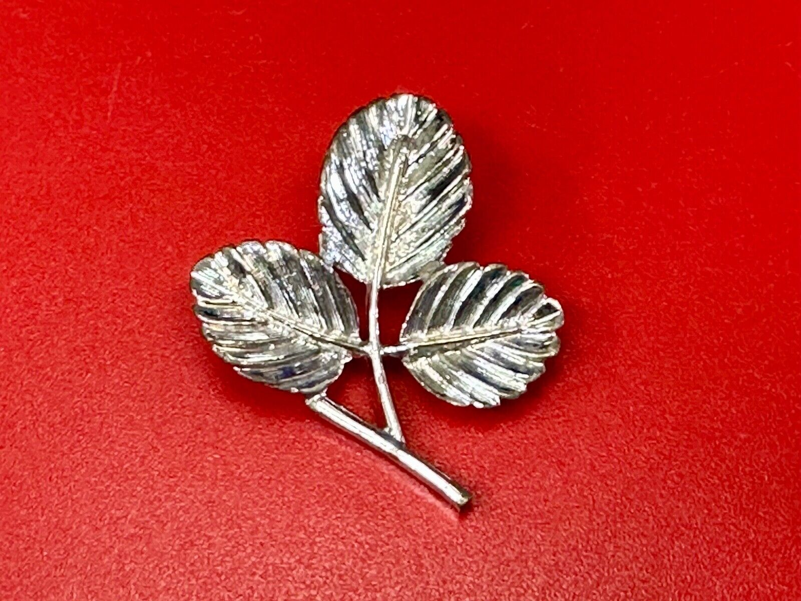 Three Leaf cutout Sarah Coventry signed silver tone brooch pin